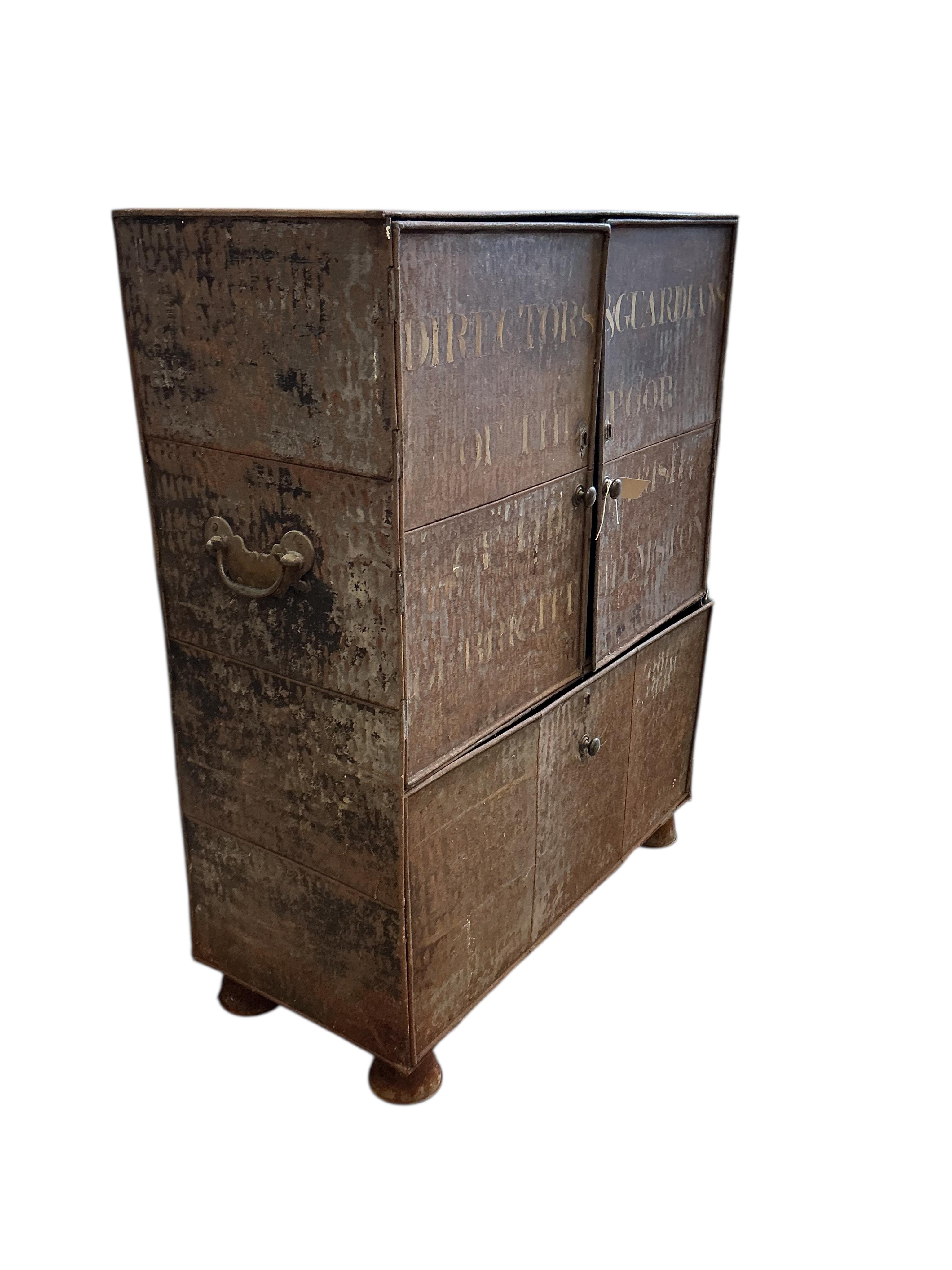 An early 19th century metal Alms chest with traces of original paint, the front with original stencilled legend 